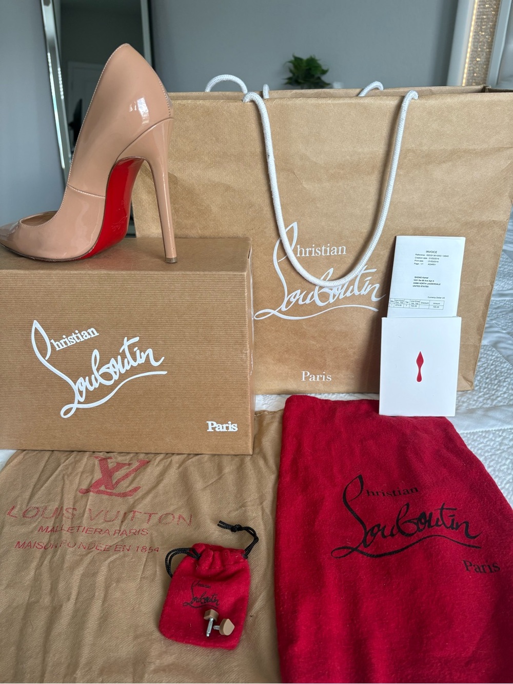 Christian Louboutin Nude Patent Leather Pumps with Signature Red Soles